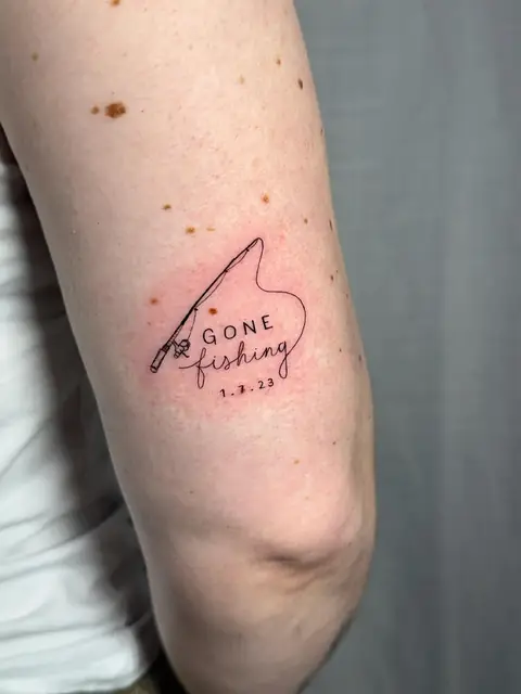“GONE fishing” with a rod and the date 1.7.23.